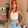 Diana participe au concours pour gagner de l'argent avec cette photo : child, girl, portrait, red_hair, white_top, blue_skirt, floral_pattern, hand_on_hip, indoor, room, vanity, mirror, pink_chair, casual, smile, long_hair, young, fashion, standing, confident