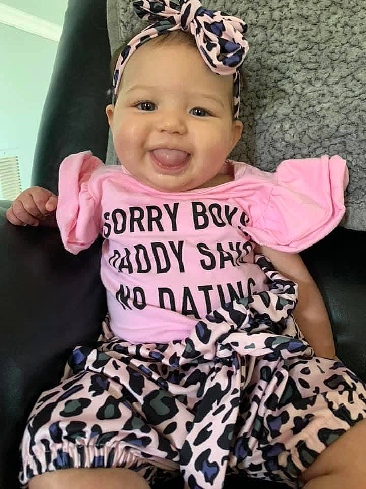 Avalyn is registered to the contest to win money with this photo: baby, baby_bloomers, baby_products, baby_toddler_clothing, child, clothing, design, ear, fashion_accessory, hair_accessory, happy, headband, headgear, headwear, pattern, person, pink, product, sleeve, toddler