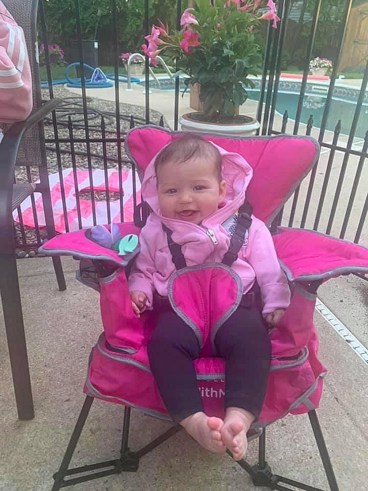 Avalyn is registered to the contest to win money with this photo: baby_products, chair, child, furniture, magenta, person, pink, plant, product, toddler