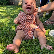 Amari joined the competition — help win amazing prizes! baby, grass, outdoor, laughter, joy, child, summer, greenery, sunlight, smile, person, cute, infant, hand, support, nature, happy, casual, patterned_clothing, barefoot