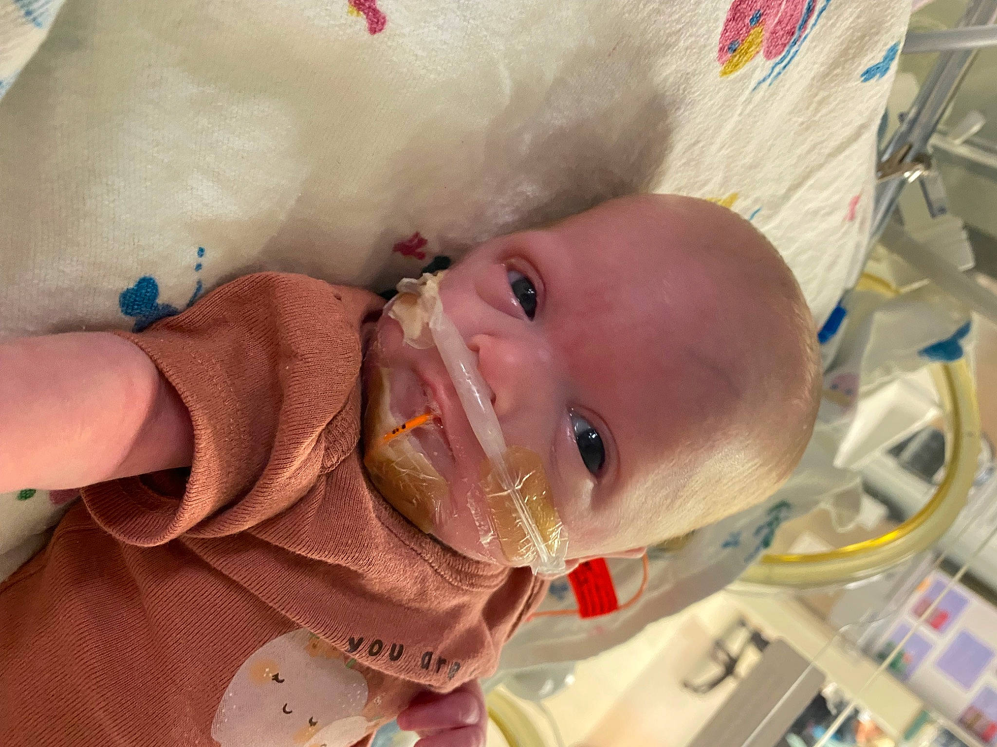 Charlee is registered to the contest to win money with this photo: baby, baby_products, baby_toddler_clothing, cheek, child, ear, eyelash, happy, headgear, iris, lip, mouth, nose, person, skin, smile, throat, toddler