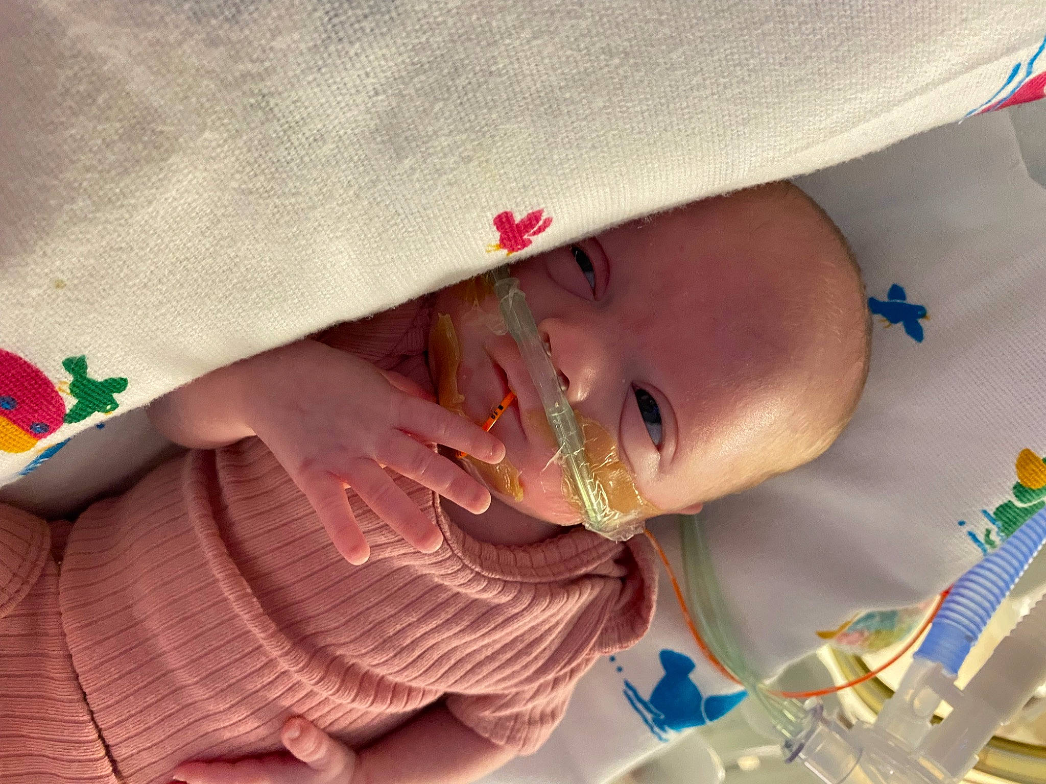 Charlee is registered to the contest to win money with this photo: baby, baby_products, child, comfort, eye, eyelash, fashion_accessory, happy, hat, jewellery, linens, lip, nail, nose, pattern, person, skin, smile, textile, toddler