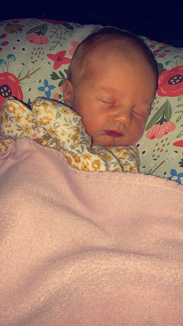 Jovi is registered to the contest to win money with this photo: baby, baby_products, baby_sleeping, baby_toddler_clothing, bed_sheet, bedding, bedtime, blanket, cheek, child, comfort, linens, nap, person, pink, room, skin, sleep, sleeve, textile