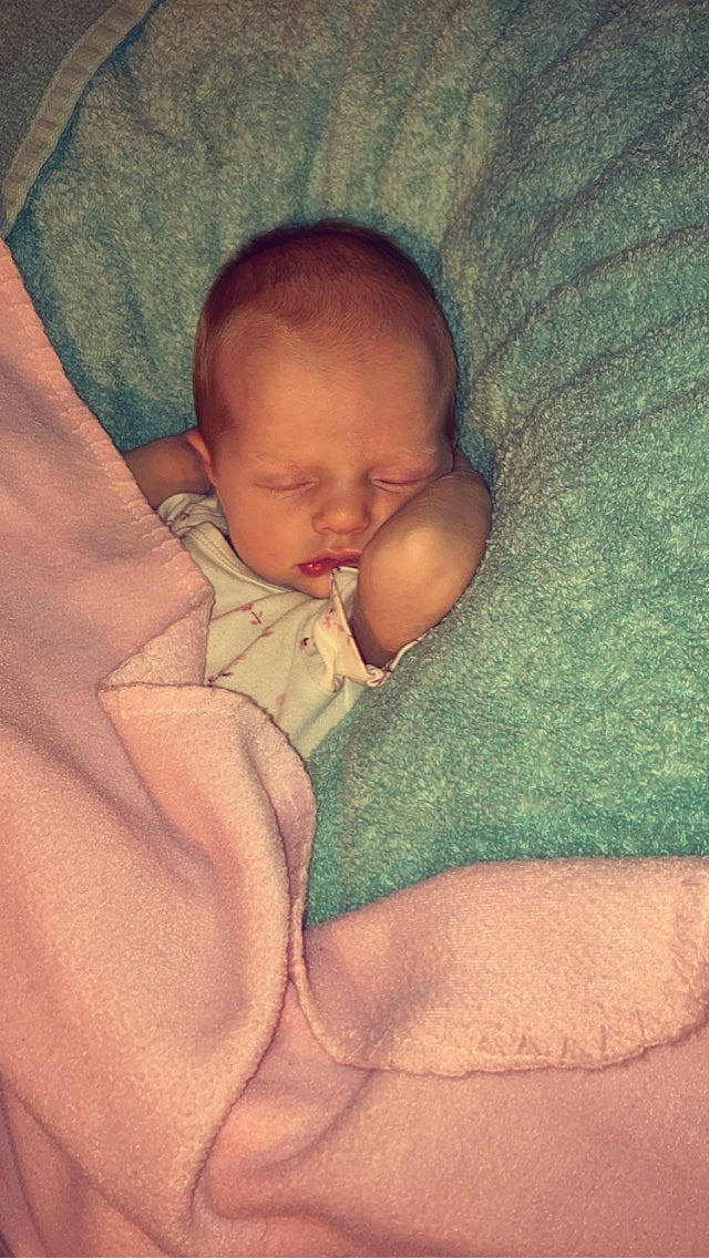 Jovi joined the competition — help win amazing prizes! baby, baby_sleeping, baby_toddler_clothing, bedtime, brown, cheek, child, chin, comfort, eye, eyebrow, face, head, iris, linens, mouth, nose, person, skin, textile