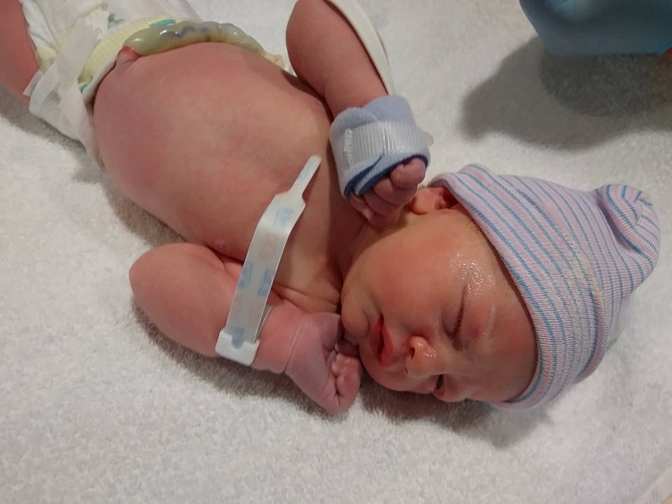 Jovi is registered to the contest to win money with this photo: baby, baby_products, baby_sleeping, baby_toddler_clothing, bedtime, child, comfort, diaper, finger, flesh, headwear, human_leg, knee, linens, medical, nap, pattern, person, room, service