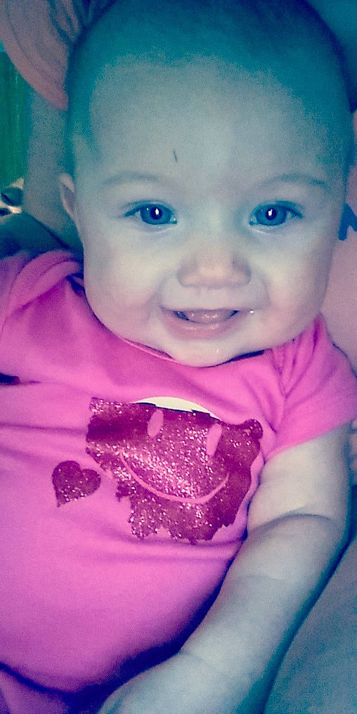 Aislyn is registered to the contest to win money with this photo: baby, blue, cheek, child, eye, eyebrow, face, facial_expression, forehead, fun, head, joy, lip, mouth, nose, organ, person, pink, purple, skin