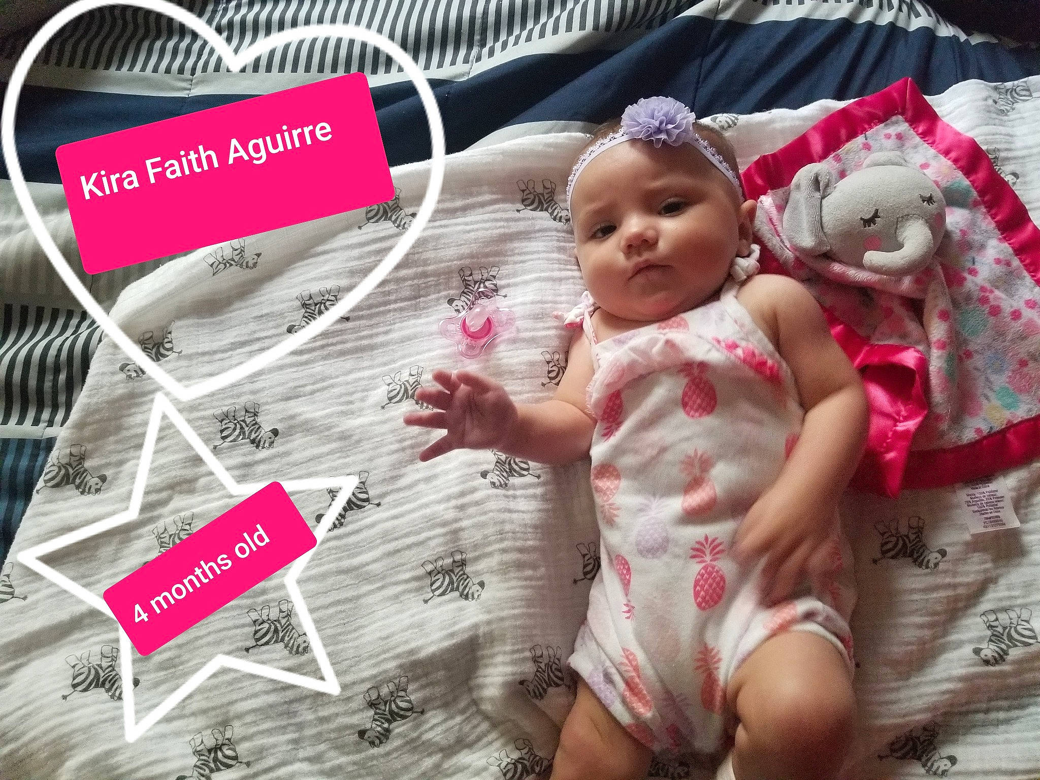 Kira is registered to the contest to win money with this photo: baby, baby_products, child, doll, happy, headwear, person, photo_caption, photography, pink, plant, play, product, textile, toddler