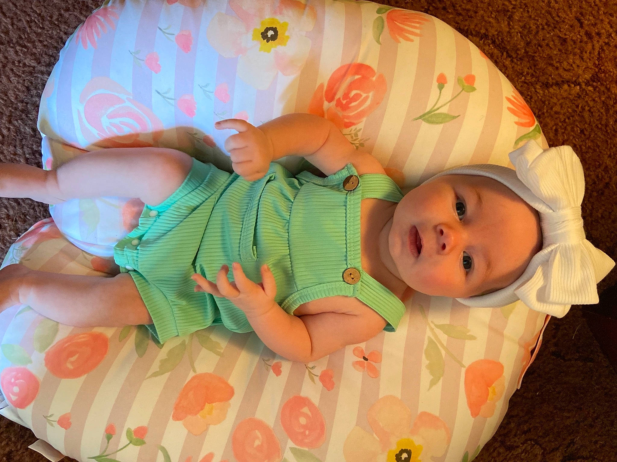 Berkley joined the competition — help win amazing prizes! baby, baby_products, baby_toddler_clothing, cheek, child, comfort, eye, face, finger, head, human_body, lap, leg, linens, orange, person, pink, product, skin, sleeve