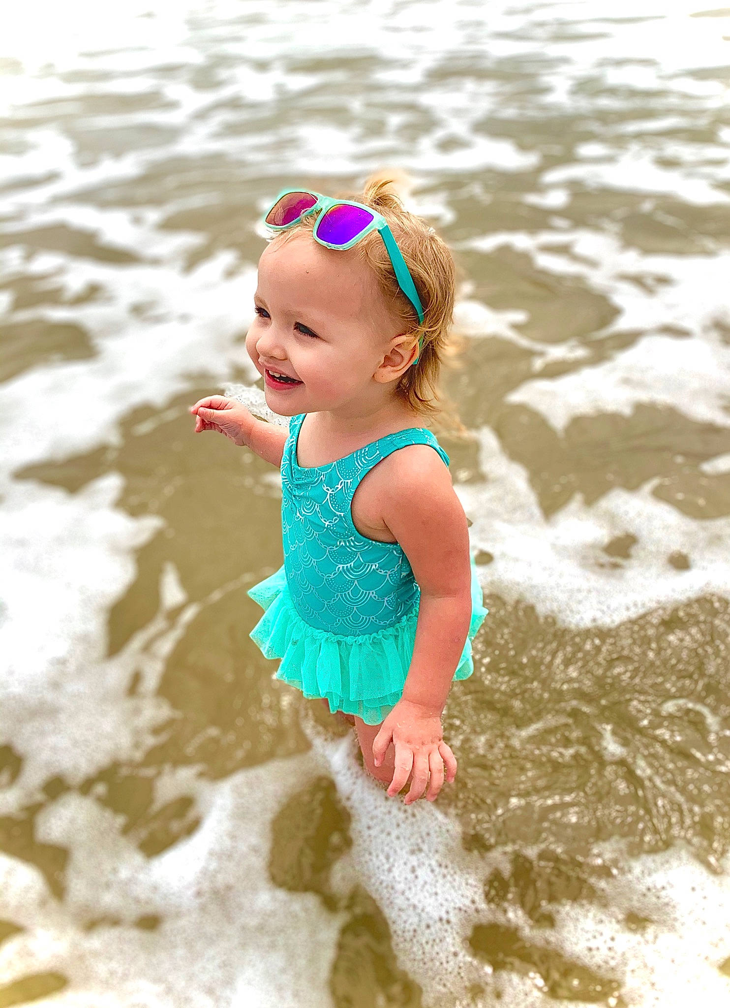 Addy Kay joined the competition — help win amazing prizes! aqua, azure, baby_toddler_clothing, beach, body_of_water, eye, face, fun, goggles, happy, hat, human_body, joy, leisure, people, people_on_beach, person, smile, sunglasses, swimwear