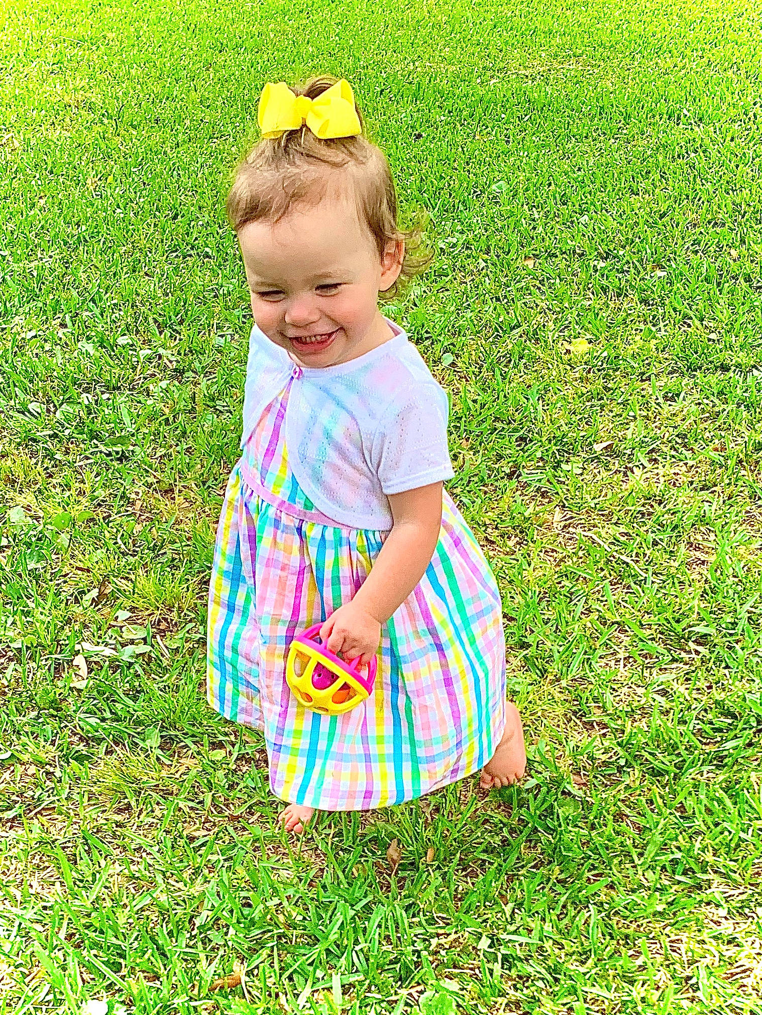 Avery is registered to the contest to win money with this photo: baby, baby_toddler_clothing, day_dress, dress, flower, fun, grass, grass_family, grassland, groundcover, happy, joy, lawn, meadow, natural_environment, people_in_nature, person, plant, prairie, smile