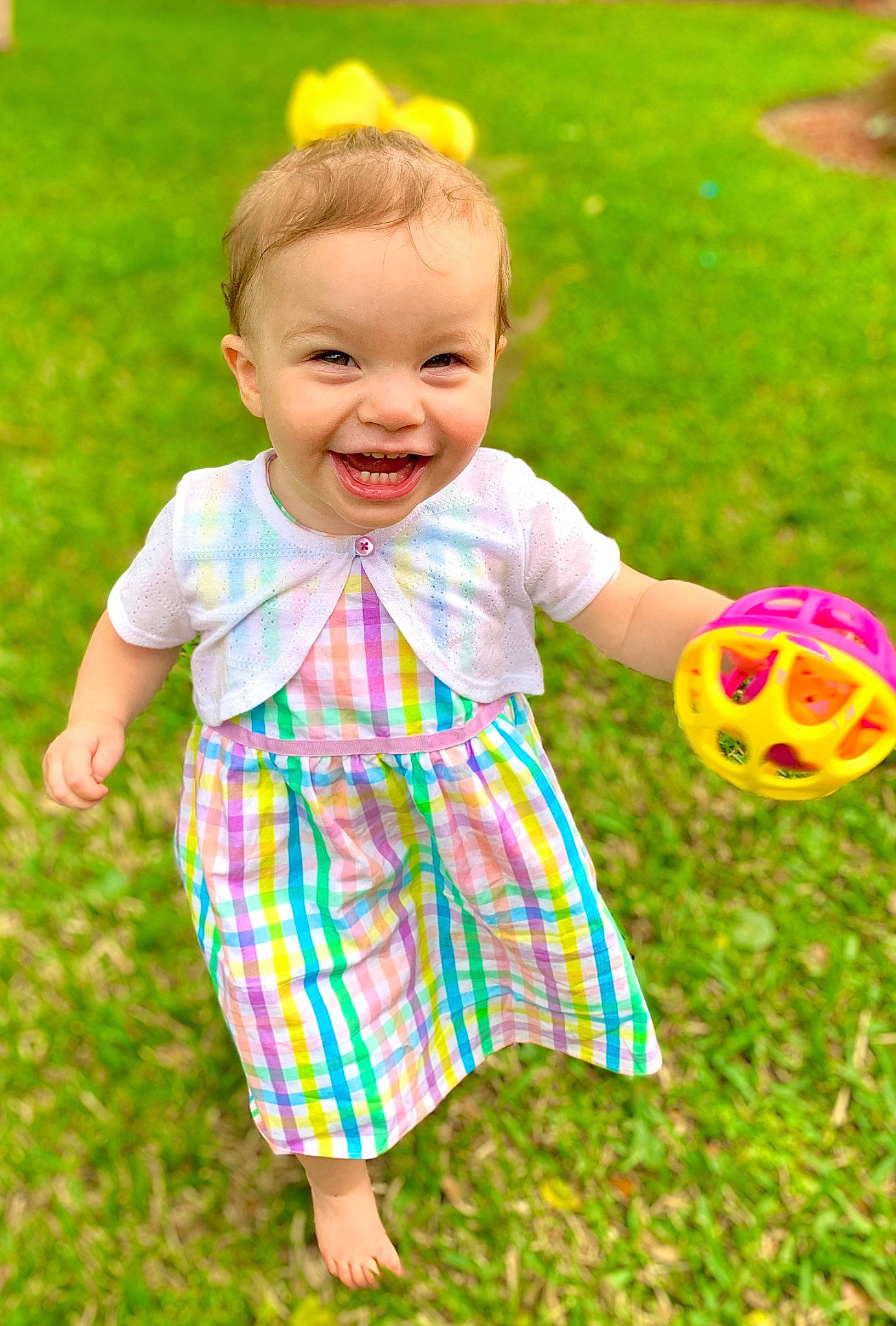 Avery joined the competition — help win amazing prizes! baby_toddler_clothing, facial_expression, grass, green, happy, joy, leaf, mammal, natural_environment, nature, people_in_nature, person, pink, plant, product, skin, sleeve, smile, sports_equipment, standing