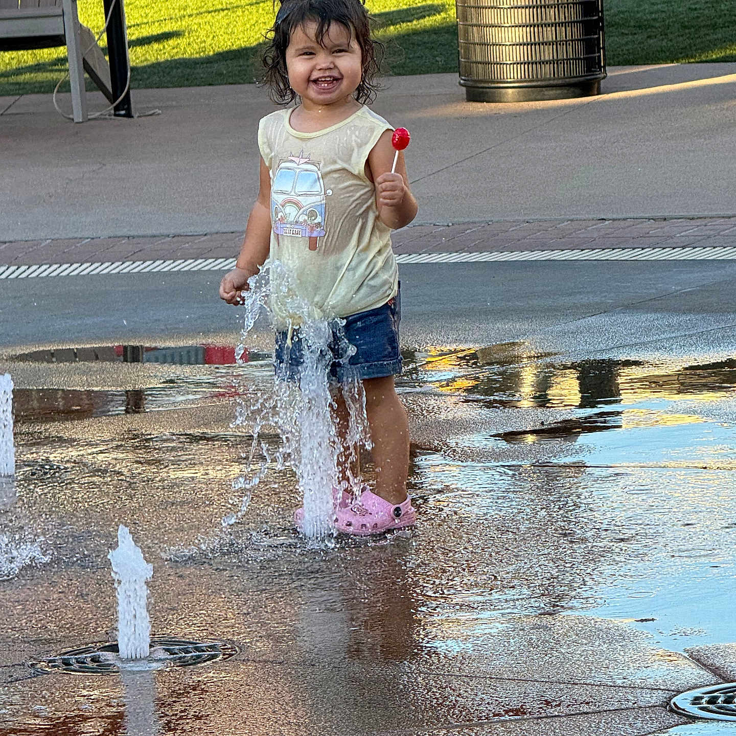 Isabella joined the competition — help win amazing prizes! amusementpark, architecture, child, city, clothing, face, female, fountain, girl, head, person, photography, portrait, puddle, shorts, summer, t_shirt, walking, water, waterpark
