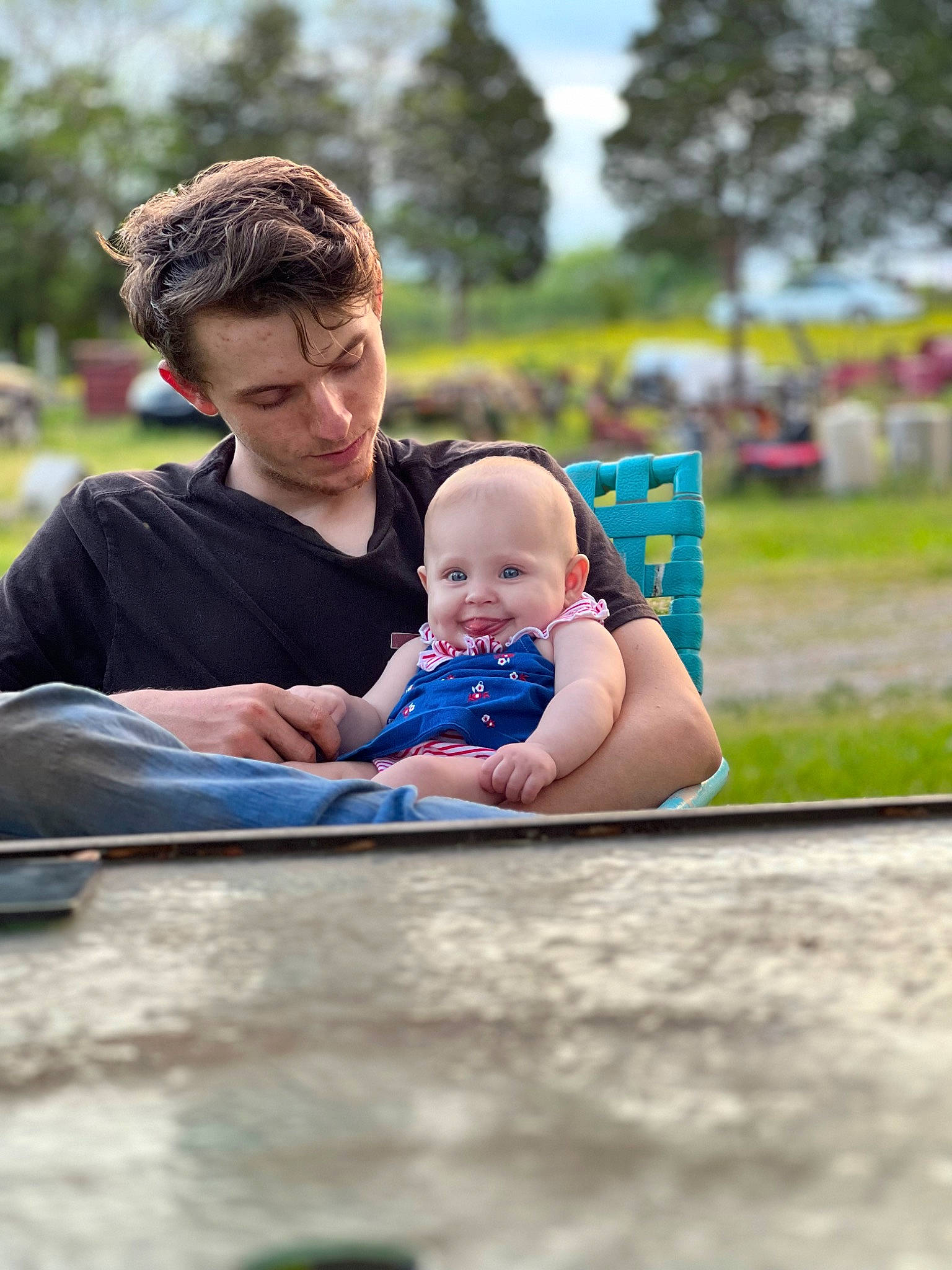 Ava joined the competition — help win amazing prizes! baby, child, event, fun, grass, happy, jeans, joy, leisure, people_in_nature, person, plant, portrait_photography, recreation, sitting, sky, t_shirt, toddler, tourism, travel