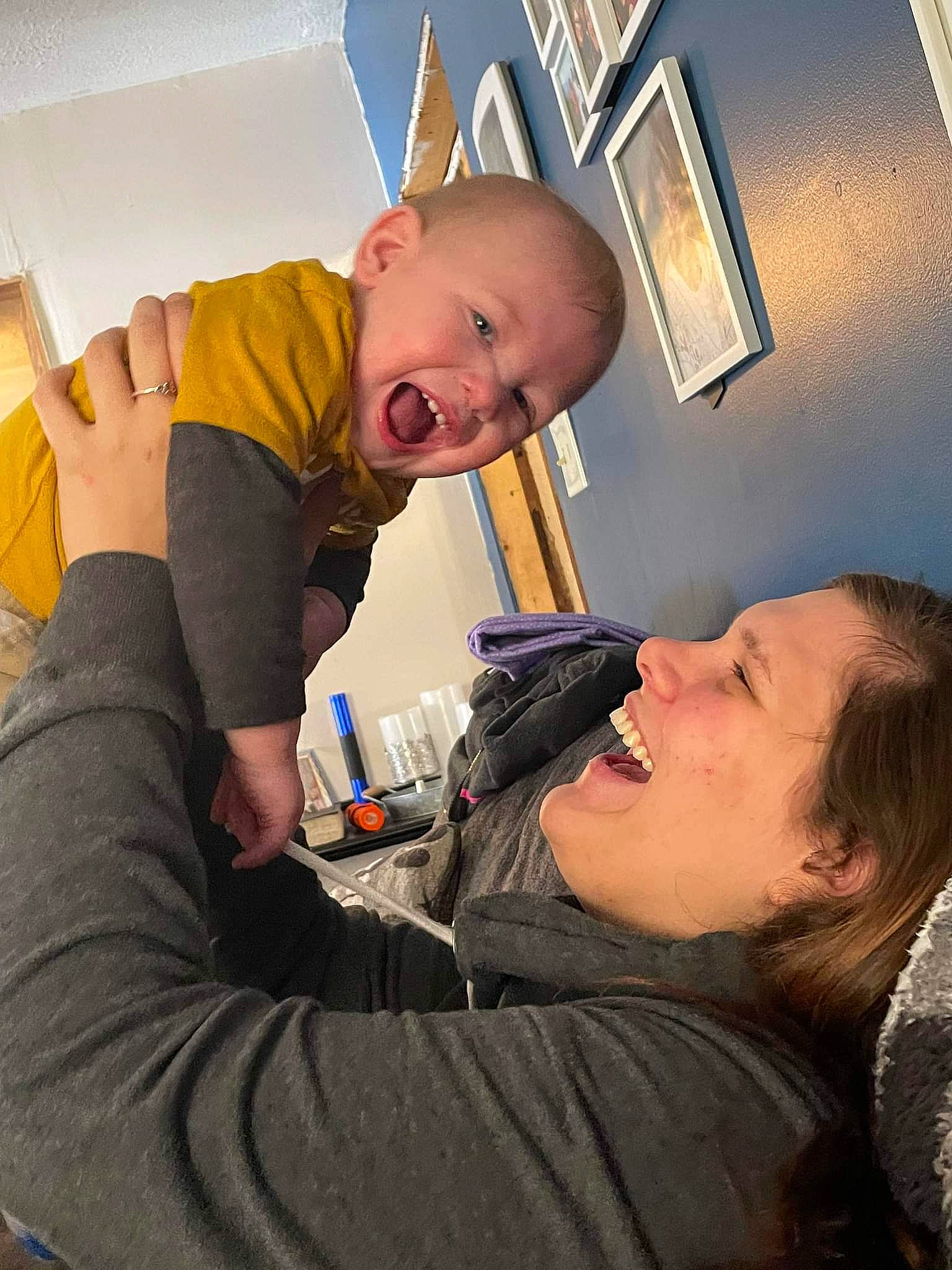 Cannon is registered to the contest to win money with this photo: arm, child, comfort, ear, elbow, finger, fun, gesture, hand, happy, joint, joy, mouth, muscle, neck, organ, person, shirt, shoulder, skin