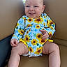 Wrenlee Jade joined the competition — help win amazing prizes! baby, child, sunflower_outfit, smile, tongue_out, sitting, leather_seat, indoor, happy, person, cute, infant, skin, head, legs, hand, clothing, blue_eyes, casual, portrait