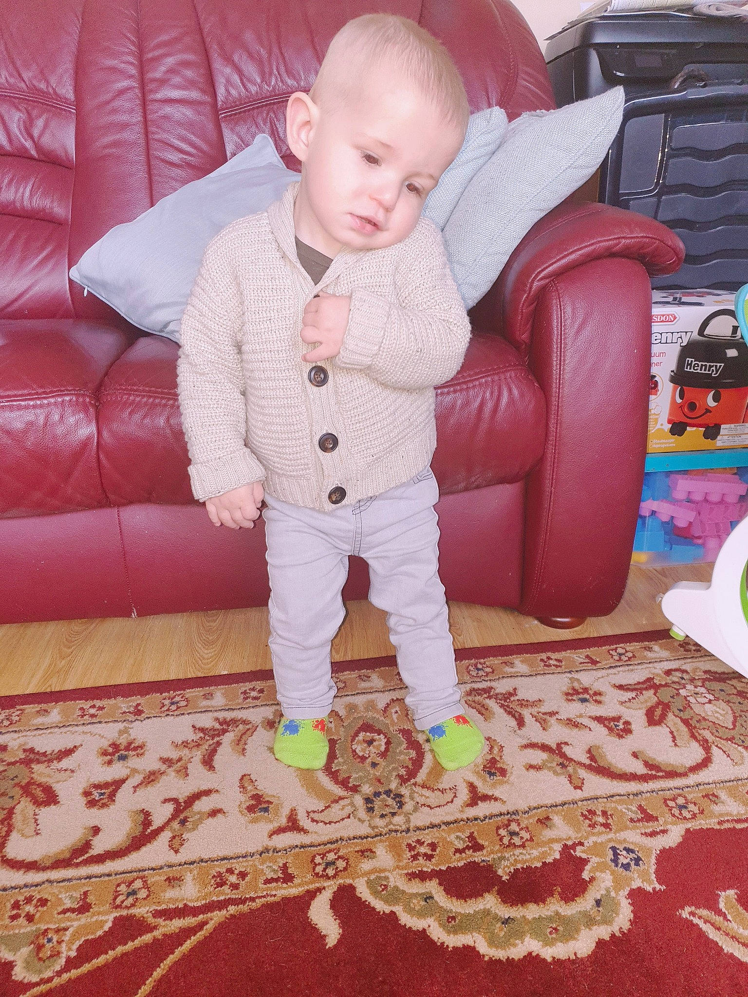 Harry joined the competition — help win amazing prizes! baby, cheek, child, flooring, footwear, leg, outerwear, pajamas, person, pink, play, room, shoe, sitting, skin, smile, toddler