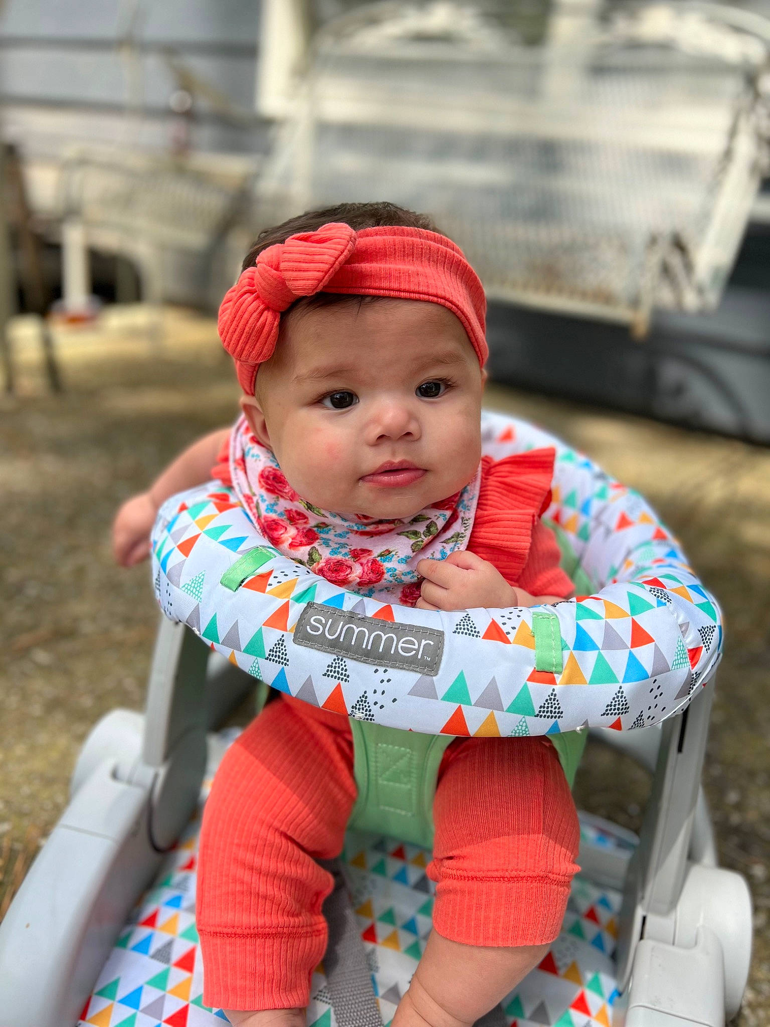 Willow is registered to the contest to win money with this photo: baby, baby_toddler_clothing, cap, child, eye, face, fashion_accessory, fun, grass, happy, head, headwear, leisure, pattern, person, personal_protective_equipment, recreation, sitting, skin, sleeve