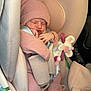 Mila a rejoint le concours — aidez-le/la à gagner de superbes lots ! baby, car_seat, knit_hat, knit_sweater, knit_booties, sleeping, plush_toy, pink, beige, child, infant, seat_belt, soft_toy, cozy, cute, indoors, car_interior, resting, warm_clothing, peaceful
