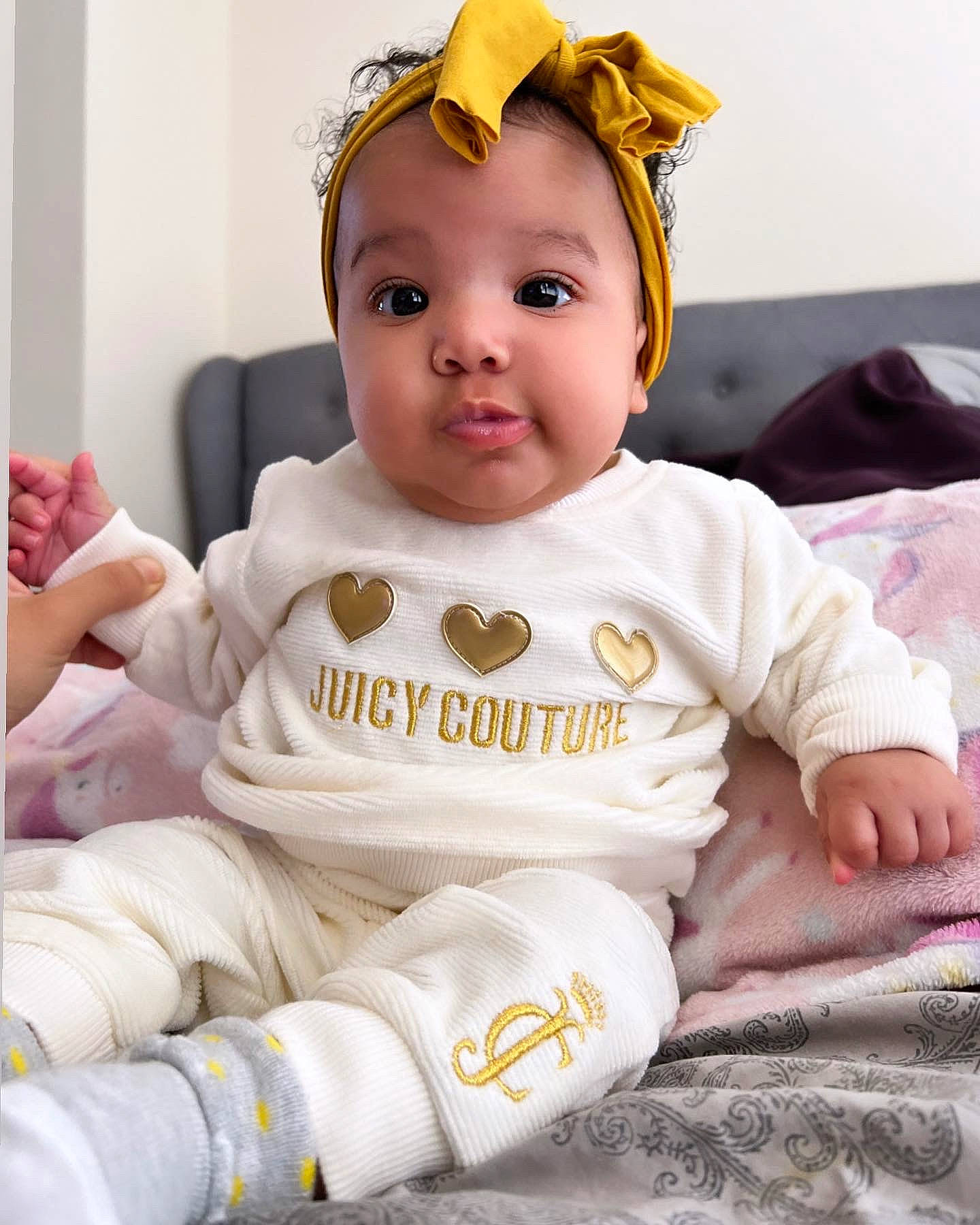Alaiya joined the competition — help win amazing prizes! baby, baby_products, baby_toddler_clothing, cap, child, comfort, costume_hat, fashion_accessory, fun, fur, happy, head, headgear, linens, person, product, sitting, sleeve, smile, t_shirt