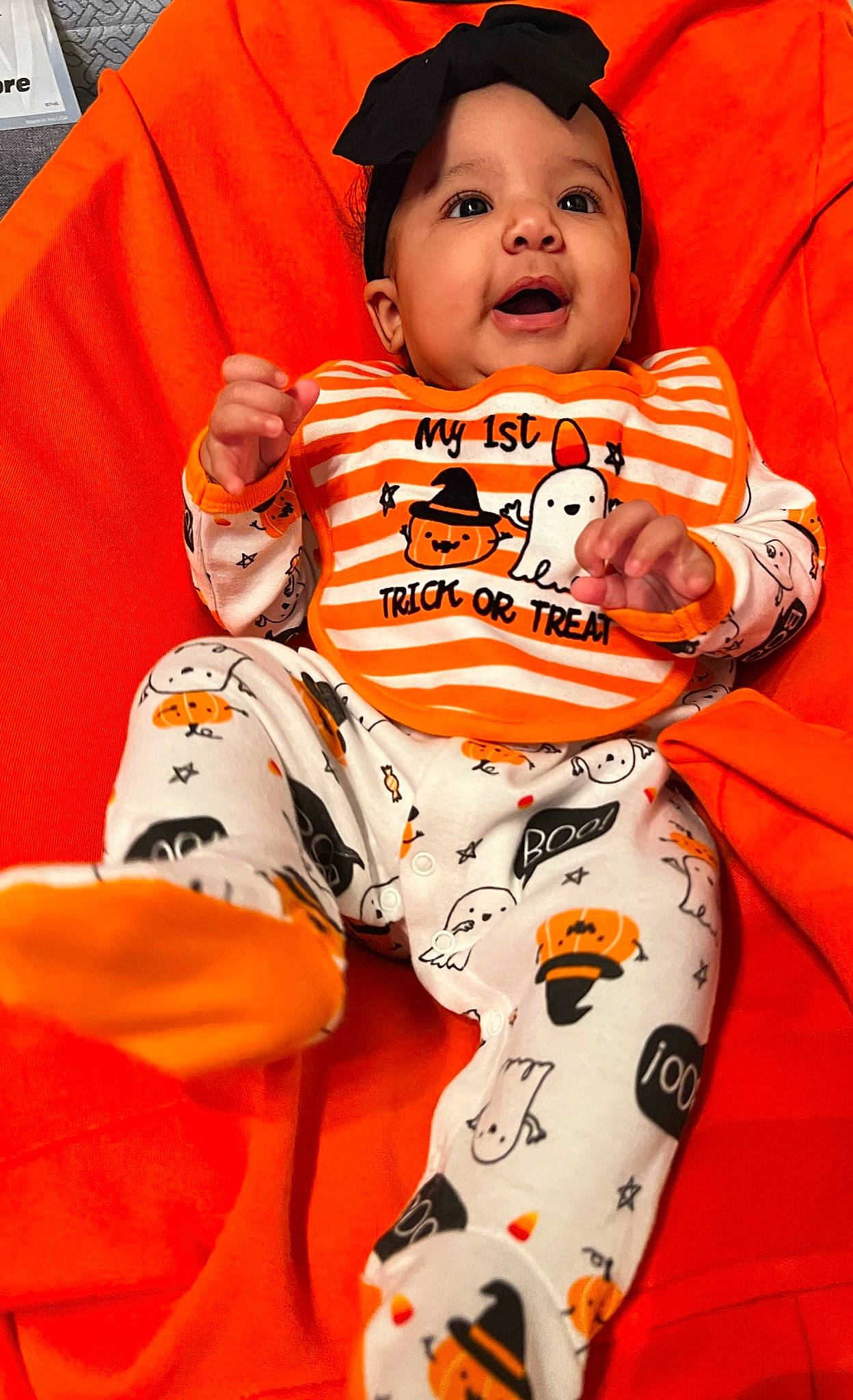 Alaiya joined the competition — help win amazing prizes! baby, baby_toddler_clothing, child, comfort, event, eye, fun, happy, head, jersey, linens, orange, pattern, person, sitting, sleeve, smile, sportswear, t_shirt, thigh