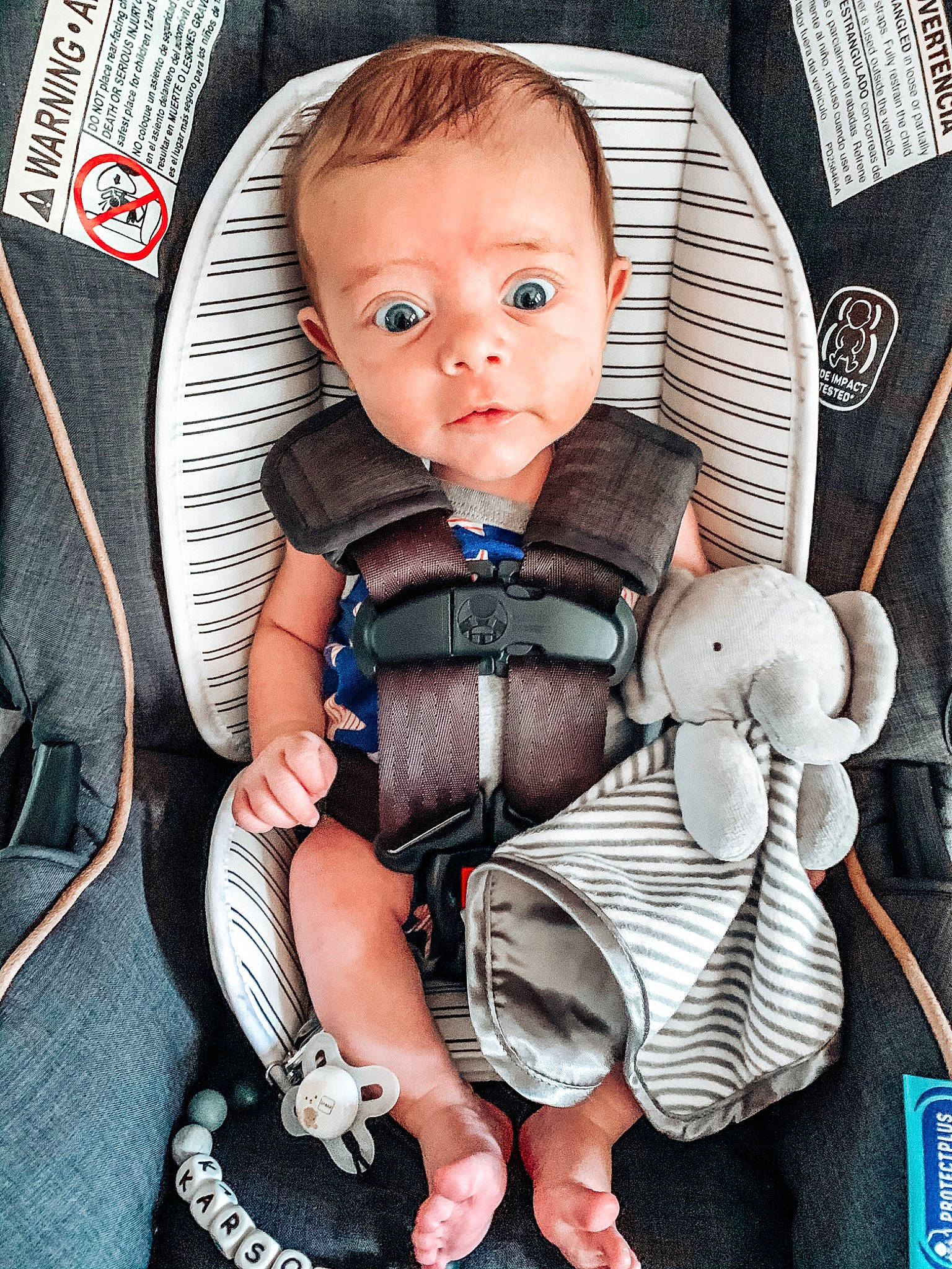 Karson is registered to the contest to win money with this photo: auto_part, baby, baby_carriage, baby_in_car_seat, baby_products, car_seat, cheek, child, person, photography, product, sitting, toddler