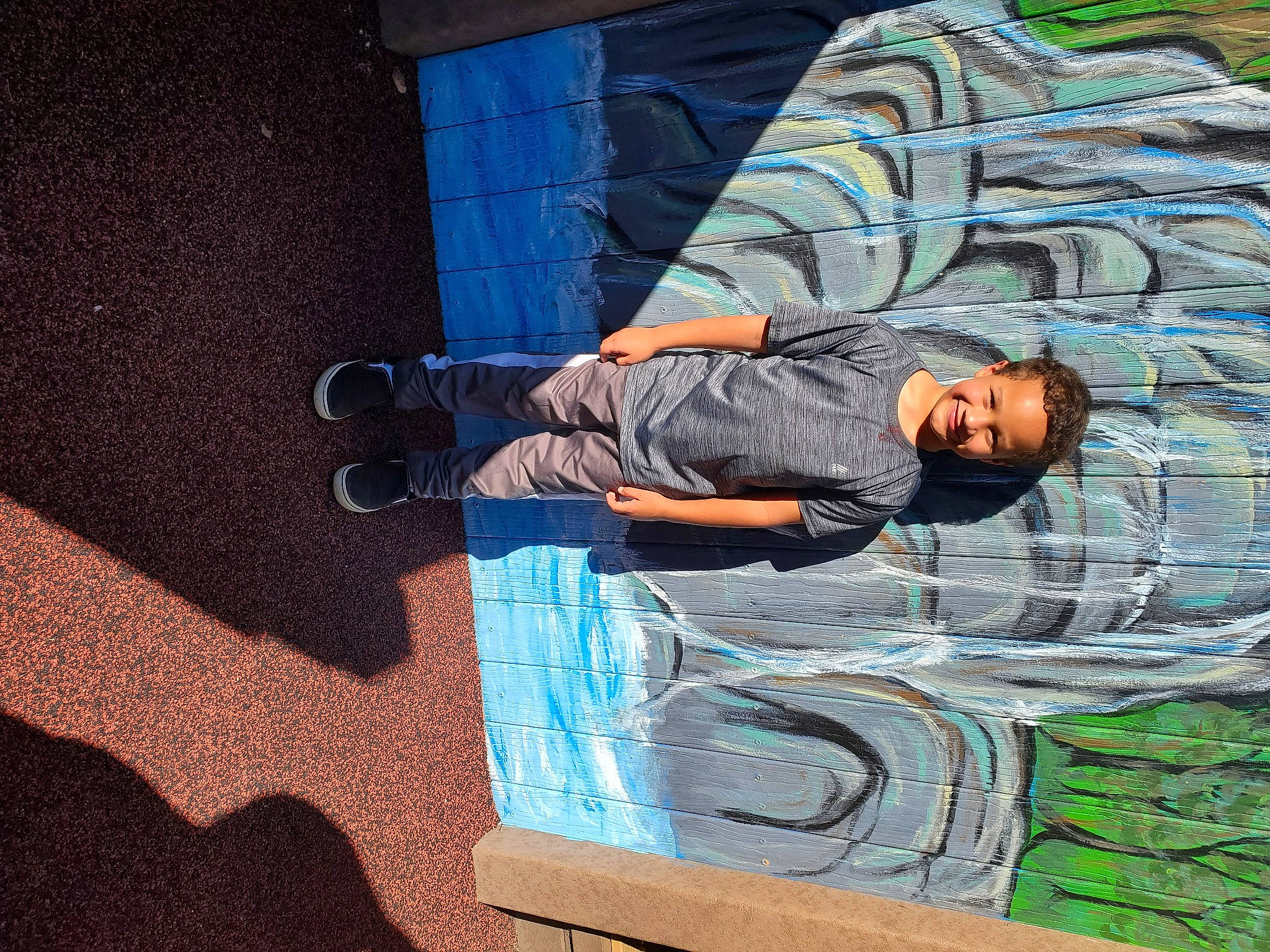 Dash joined the competition — help win amazing prizes! asphalt, concrete, denim, electric_blue, flooring, fun, grass, human_leg, joy, leisure, pattern, person, road_surface, shadow, sidewalk, sitting, street, tints_and_shades, visual_arts, world