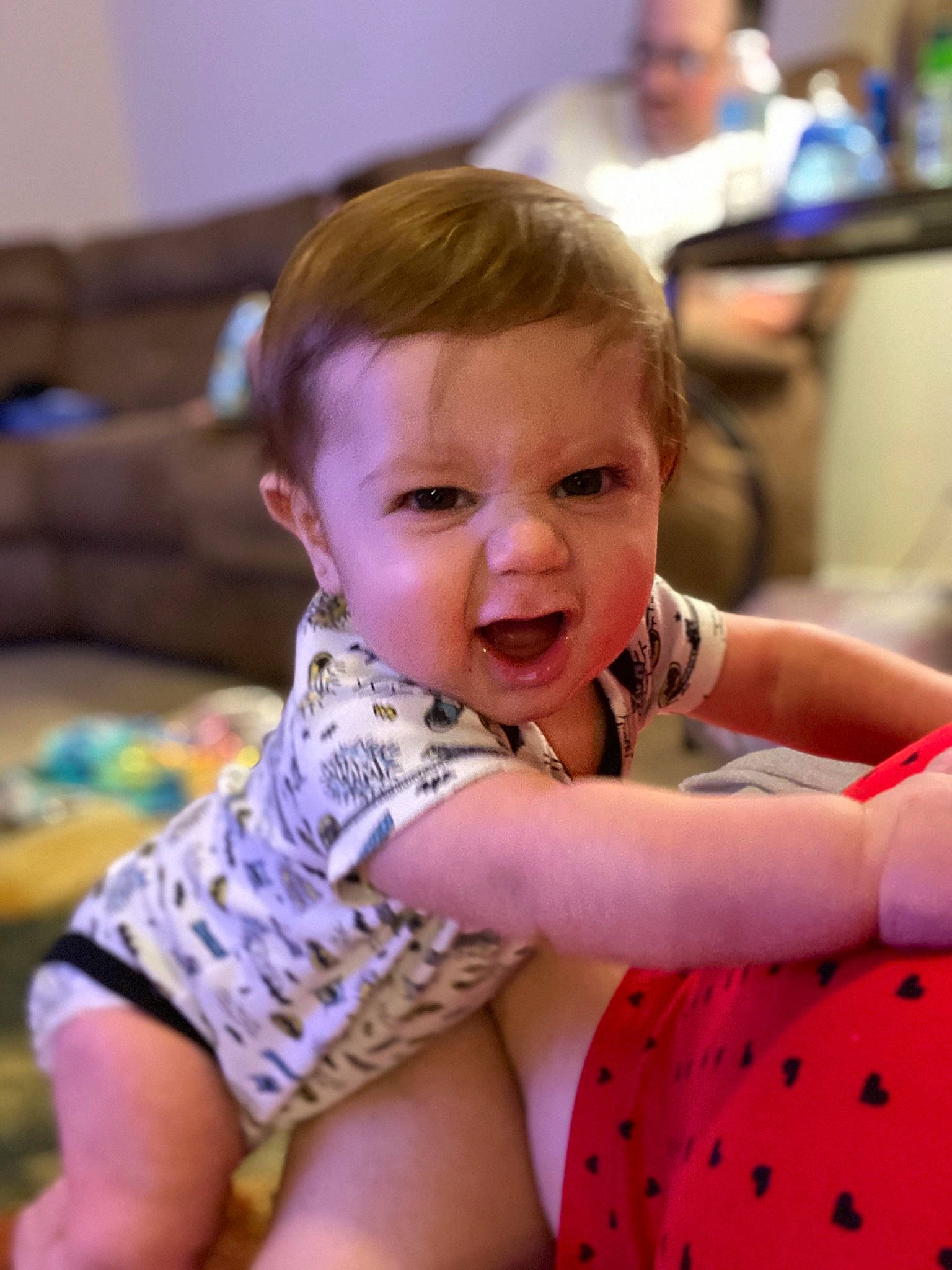 Ragnar Tripp is registered to the contest to win money with this photo: arm, baby, beauty, cheek, child, daughter, eye, face, facial_expression, finger, fun, happy, head, iris, person, sitting, skin, smile, thumb, toddler