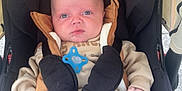 Myles joined the competition — help win amazing prizes! baby, stroller, child, infant, clothing, seatbelt, black, cream, brown, footwear, face, blue_eyes, hands, baby_clothes, baby_girl, baby_boy, outdoor, casual, candid, infant_seat