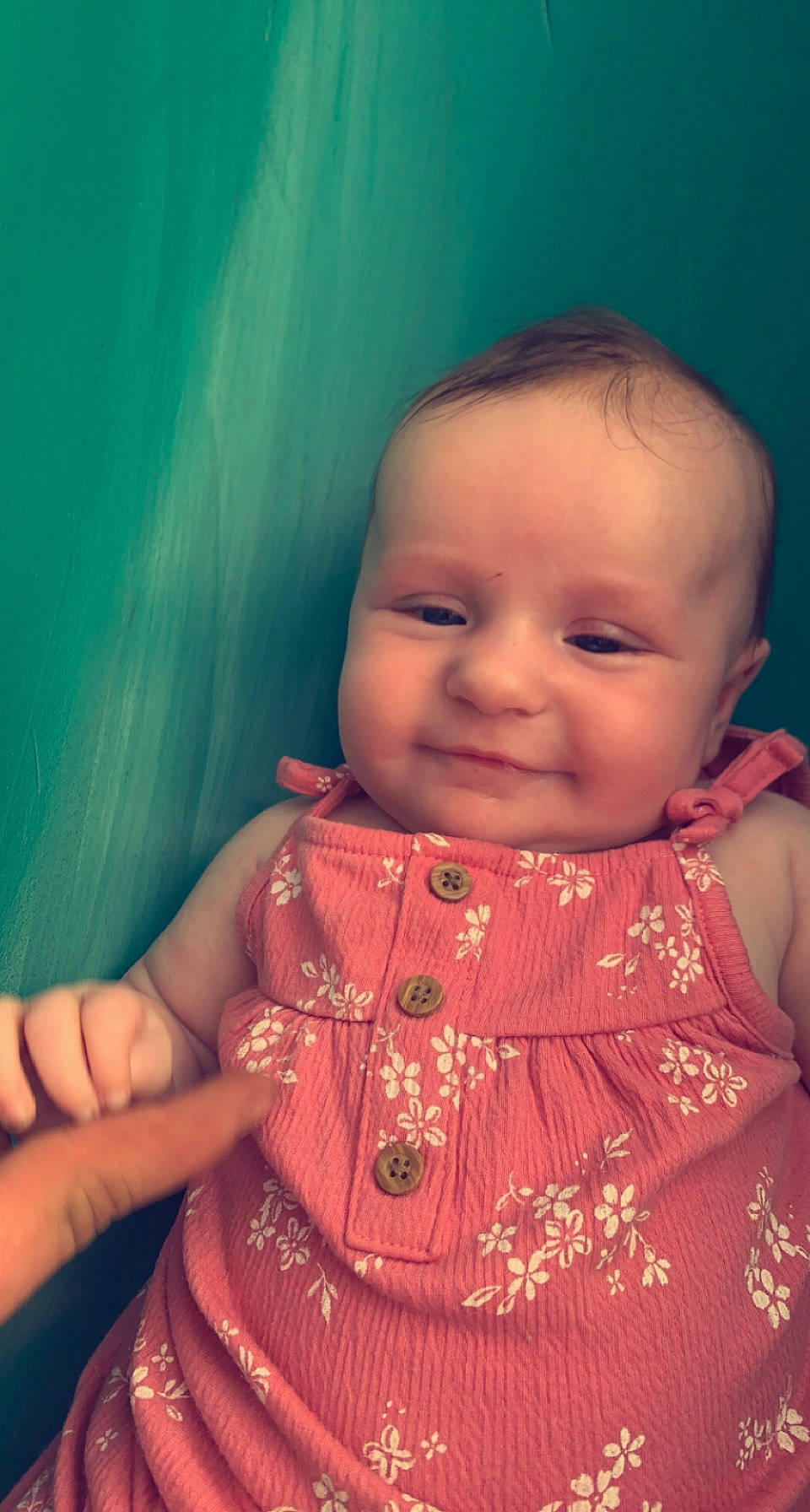 Makenzie is registered to the contest to win money with this photo: baby, baby_toddler_clothing, cheek, chin, dress, eye, eyebrow, facial_expression, forehead, happy, human_body, iris, joy, lip, mouth, neck, nose, person, pink, skin