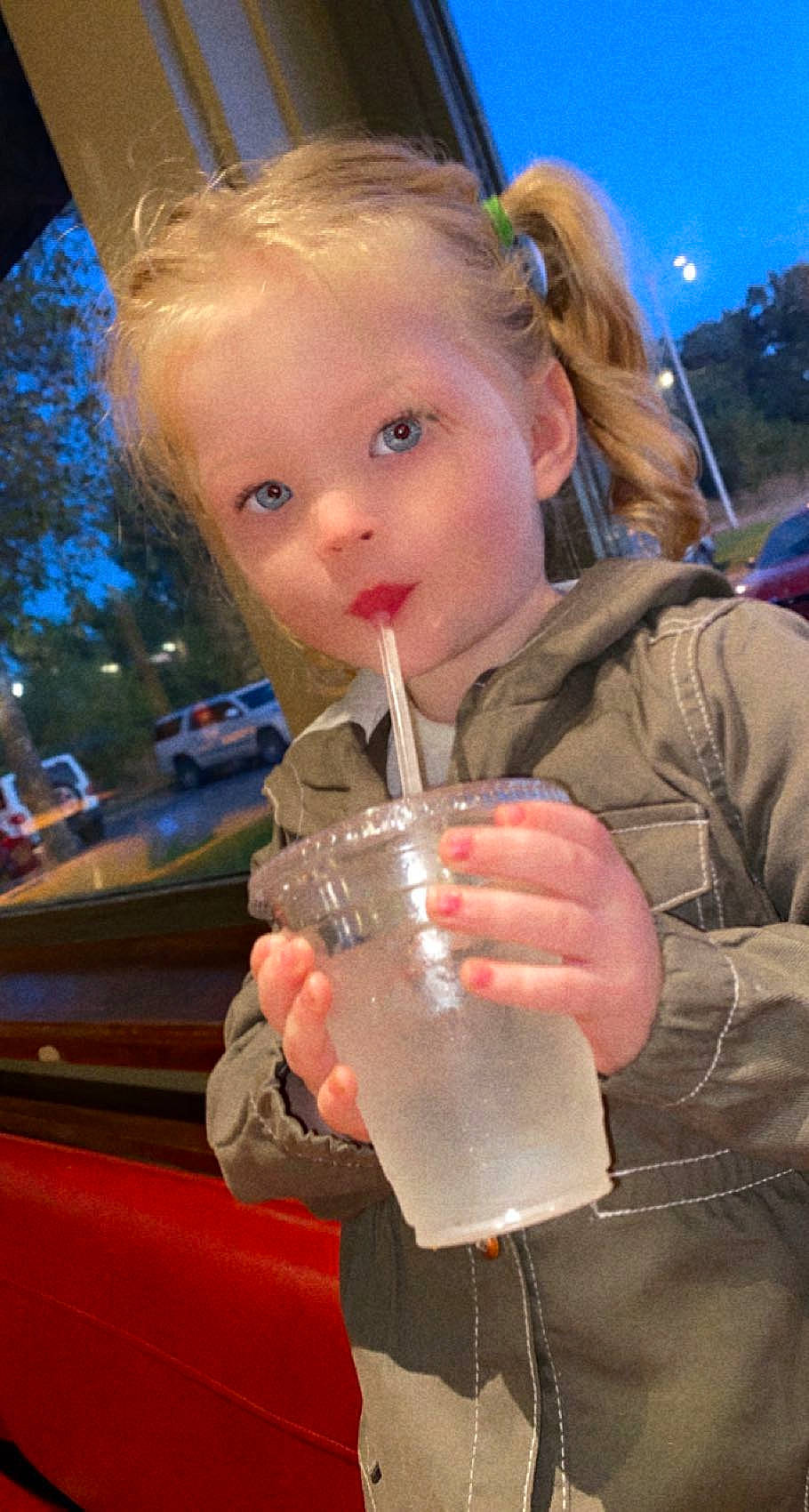 Harper joined the competition — help win amazing prizes! blond, brown_hair, child, drink, drinking, drinkware, event, food, fun, glass, hairstyle, happy, leisure, non_alcoholic_beverage, people, person, sky, snapshot, toddler, tree
