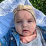 Arya participe au concours pour gagner de l'argent avec cette photo : apparel, baby, child, closeup, cute, deer_pattern, denim_jacket, face, flowers, grass, headband, headwear, infant, nature, outdoor, person, portrait, shirt, white_cloth, young