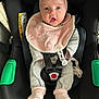 Arya a rejoint le concours — aidez-le/la à gagner de superbes lots ! accessory, apparel, baby, bib, car_seat, child, clothing, cute, expression, headband, indoor, infant, newborn, person, pink, safety, seat, seatbelt, socks, straps