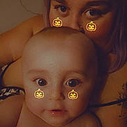 Charley joined the competition — help win amazing prizes! baby, adult, face, eyes, skin, closeup, portrait, person, child, head, cheeks, pumpkin_filter, tattoo, intimate, warm, lighting, expression, indoor, family, cute