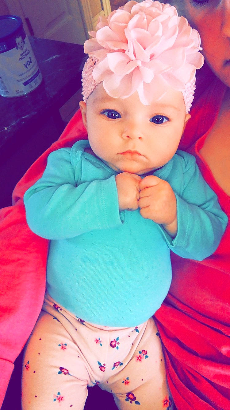 Ella Mae joined the competition — help win amazing prizes! baby, baby_toddler_clothing, cheek, child, child_model, ear, eye, face, forehead, fun, hair_accessory, head, lip, nose, person, pink, skin, smile, toddler