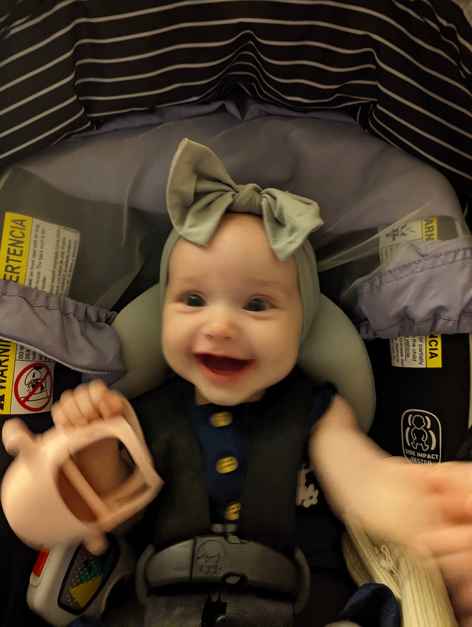 Amber is registered to the contest to win money with this photo: auto_part, baby, baby_carriage, baby_products, baby_toddler_clothing, car_seat, carmine, cheek, child, costume, fashion_accessory, fictional_character, fun, happy, headwear, human_body, joy, person, personal_protective_equipment, smile