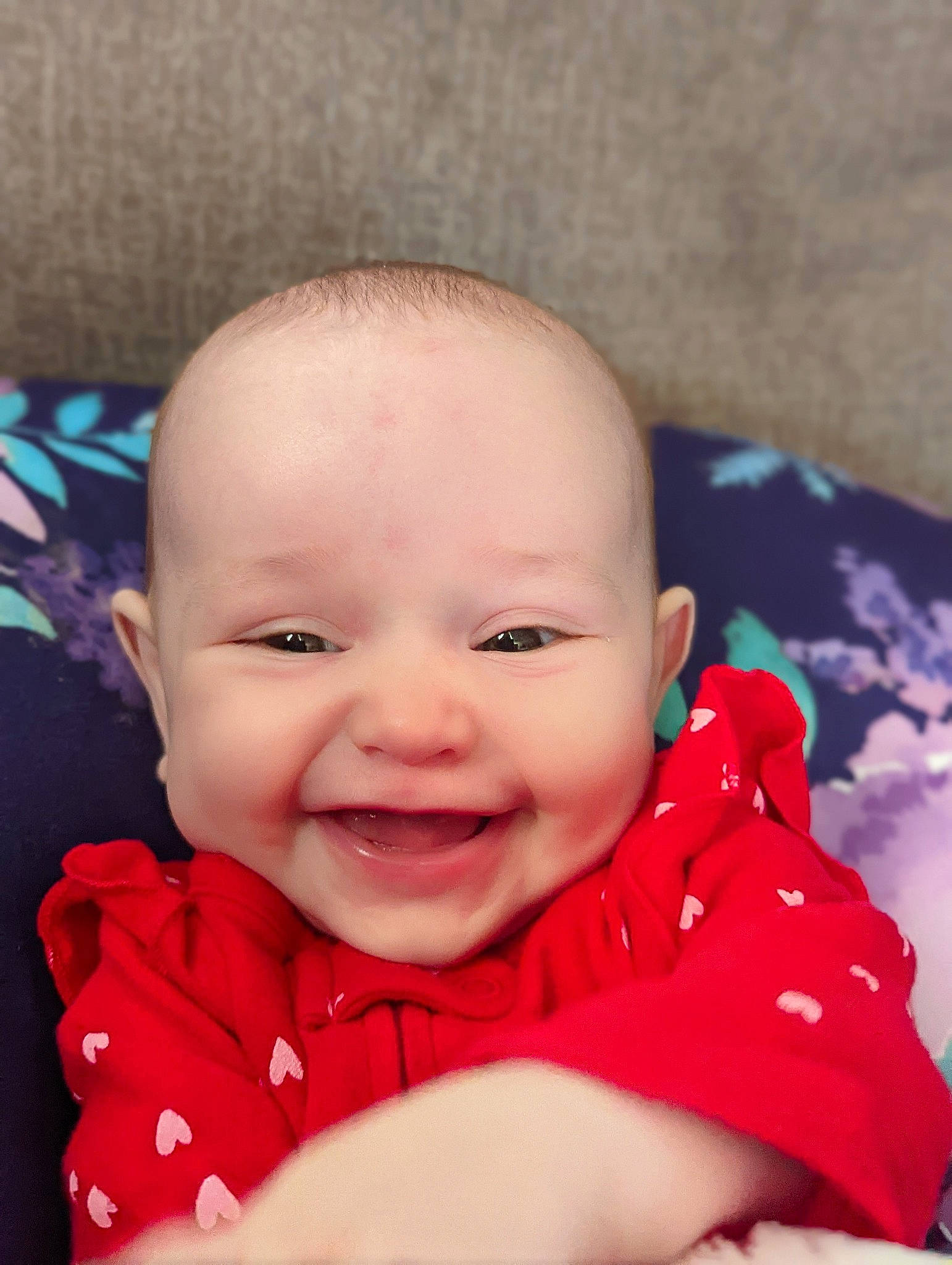 Amber is registered to the contest to win money with this photo: baby, baby_laughing, baby_toddler_clothing, cheek, child, chin, comfort, eyelash, fun, gesture, happy, iris, joy, lip, mouth, nose, person, pink, skin, sleeve