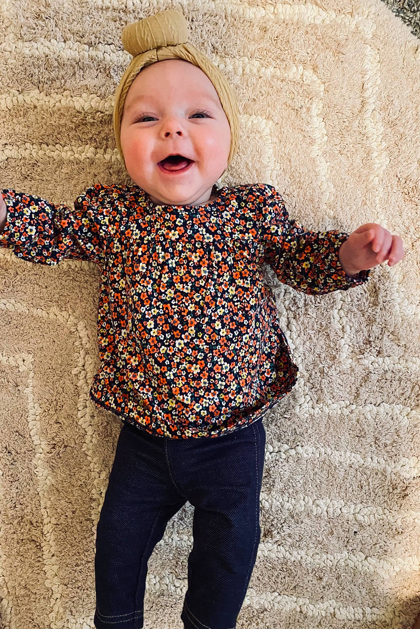 Oaklyn is registered to the contest to win money with this photo: arm, baby, baby_toddler_clothing, child, cool, eye, facial_expression, gesture, grass, happy, head, human_body, outerwear, people_in_nature, person, photograph, sleeve, smile, standing, textile