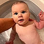 baby, bath, water, hand, skin, face, eyes, infant, child, cute, expression, human, person, naked, young, blue_eyes, wet, support, bath_tub, close_up