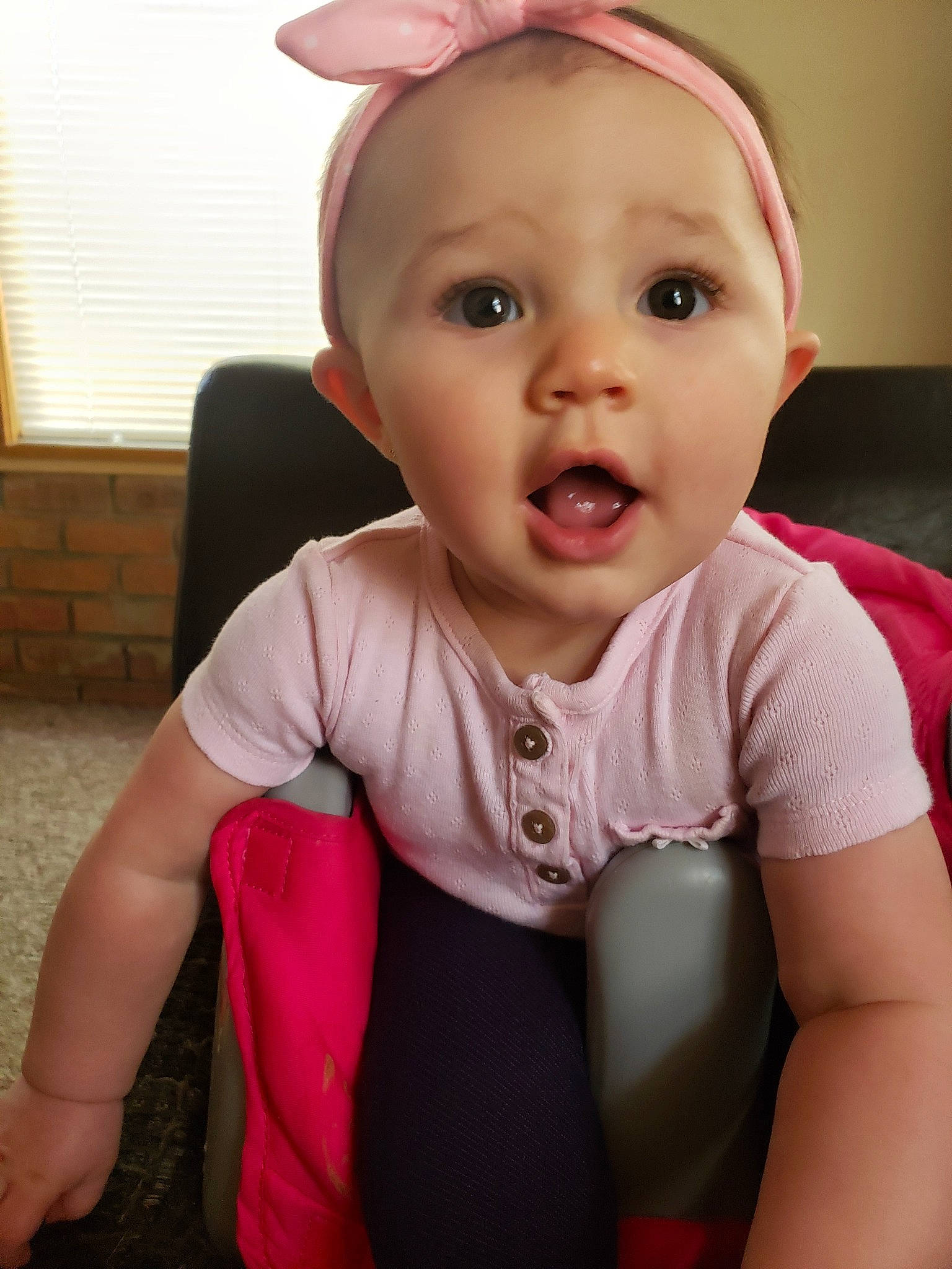 Averie joined the competition — help win amazing prizes! baby, baby_products, baby_toddler_clothing, cheek, child, ear, head, lip, person, pink, skin, smile, surprise, toddler