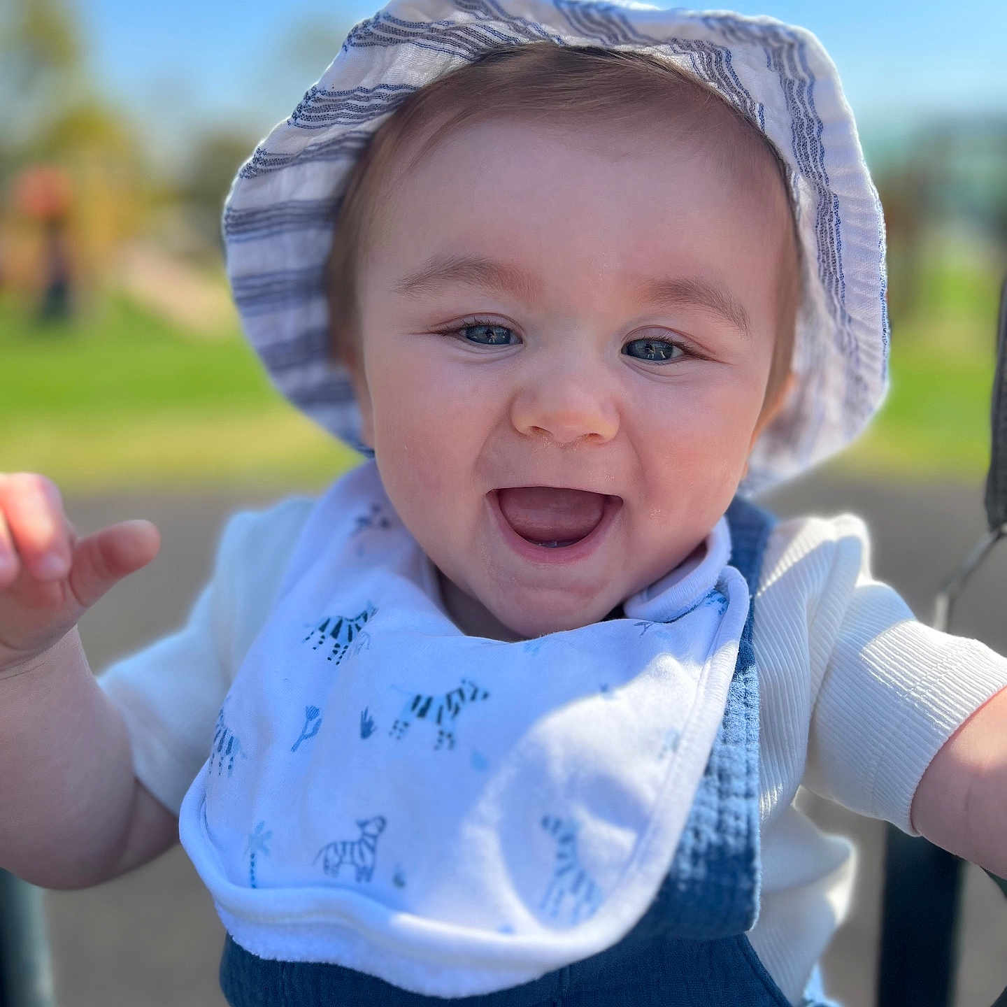 Luca joined the competition — help win amazing prizes! baby, babylaughing, bodypart, bonnet, cap, clothing, face, finger, grass, hand, happy, hat, head, laughing, person, photography, plant, portrait, smile, sunhat