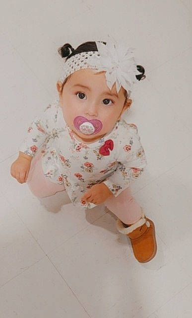 Cedar joined the competition — help win amazing prizes! baby, baby_products, baby_toddler_clothing, cap, cheek, child, costume_hat, dress, eye, fashion_accessory, flooring, happy, head, headband, headgear, headwear, lip, pattern, peach, person