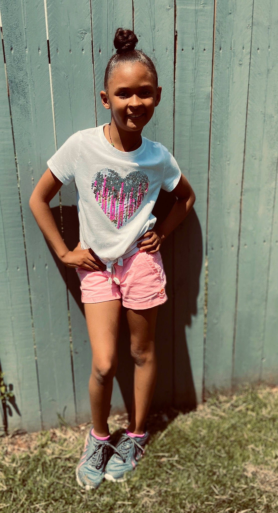 Aakylah joined the competition — help win amazing prizes! cool, fun, grass, happy, joy, knee, leisure, magenta, person, pink, shoe, shorts, sleeve, smile, sneakers, street_fashion, t_shirt, textile, thigh, trunk