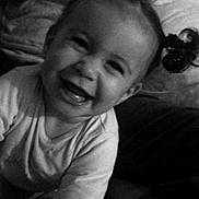 Mayssa participe au concours pour gagner de l'argent avec cette photo : baby, child, smiling, pigtails, black_and_white, portrait, happy, indoor, cute, face, infant, clothing, person, head, joy, expression, young, cheerful, closeup, baby_girl
