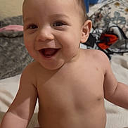 Leon joined the competition — help win amazing prizes! baby, blanket, child, cozy, cute, diaper, expression, face, happy, head, home, indoors, infant, joy, person, portrait, sitting, skin, smiling, young