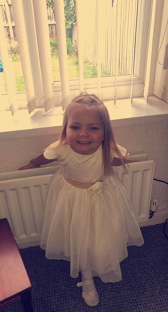 Dolly joined the competition — help win amazing prizes! blond, child, dress, event, eye, facial_expression, floor, flooring, fun, gesture, happy, hardwood, iris, joy, long_hair, person, product, room, shoulder, smile