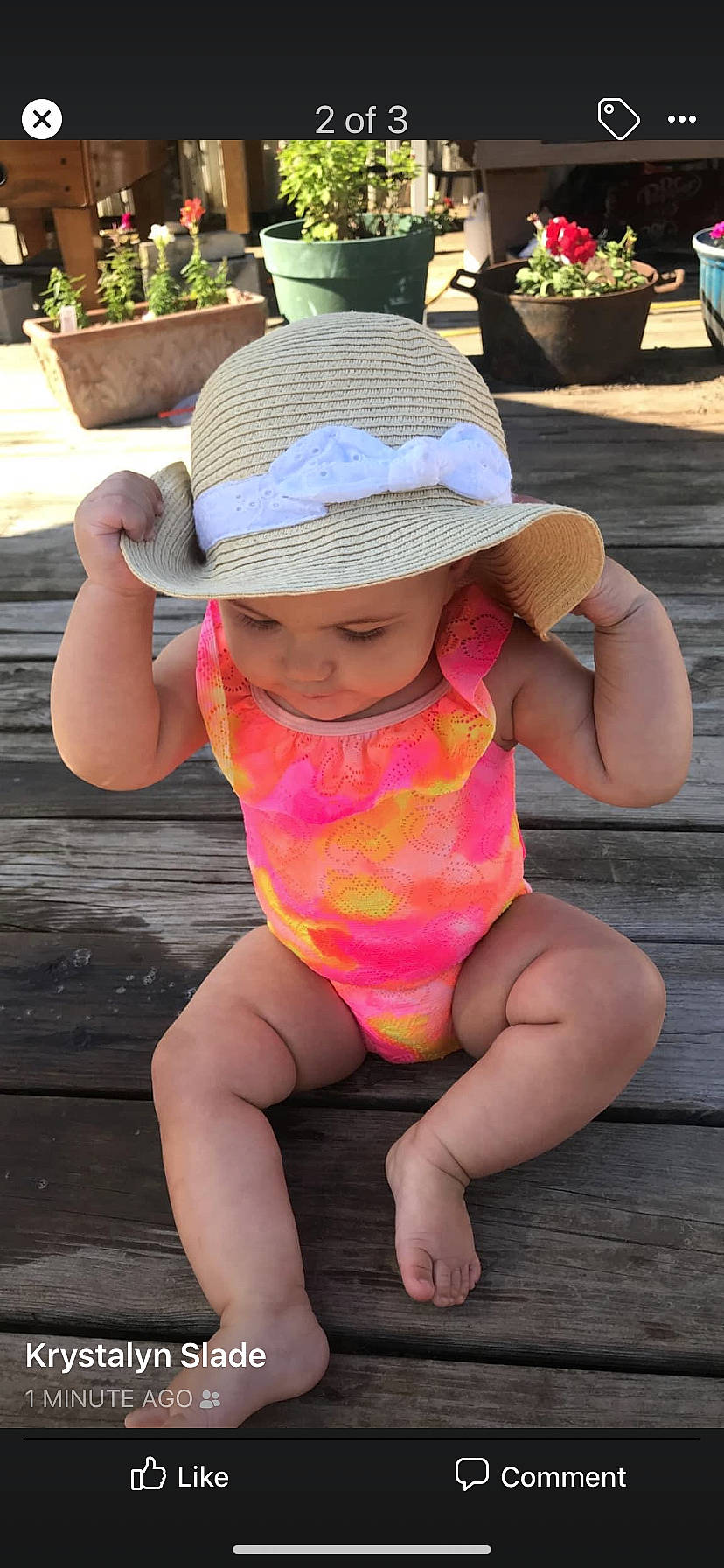 Ellarose is registered to the contest to win money with this photo: baby, baby_toddler_clothing, child, clothing, fashion_accessory, hat, headgear, headwear, leg, person, play, sitting, sun_hat, toddler, vacation
