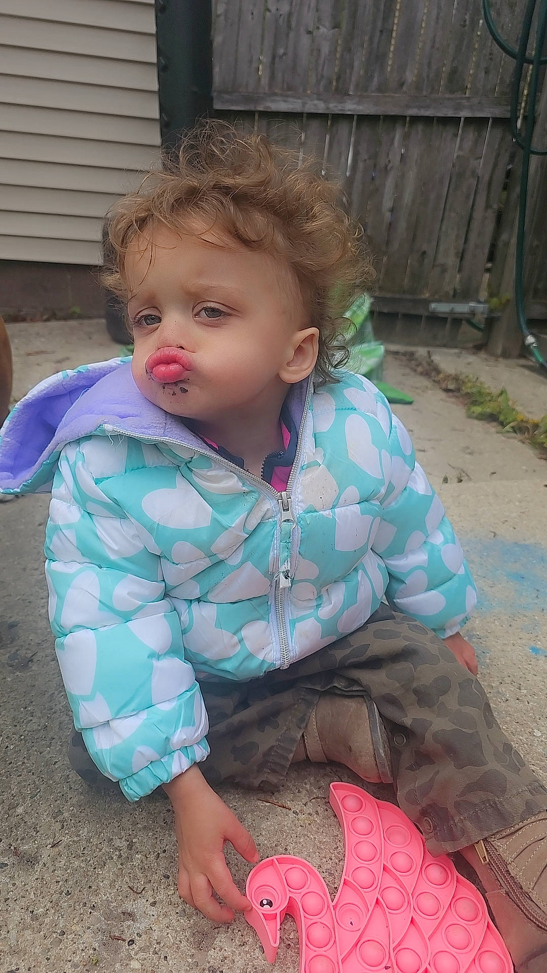 Iris is registered to the contest to win money with this photo: baby, baby_toddler_clothing, blond, cheek, child, chin, eye, face, fun, grass, hair, iris, lip, mouth, nose, person, pink, skin, sleeve, summer