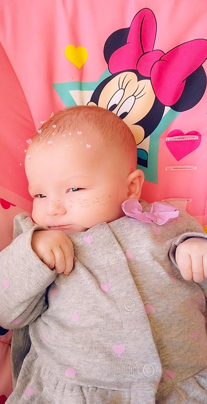 Montana is registered to the contest to win money with this photo: baby, baby_products, baby_toddler_clothing, baby_toys, cheek, child, finger, linens, nail, peach, person, pink, skin, toy