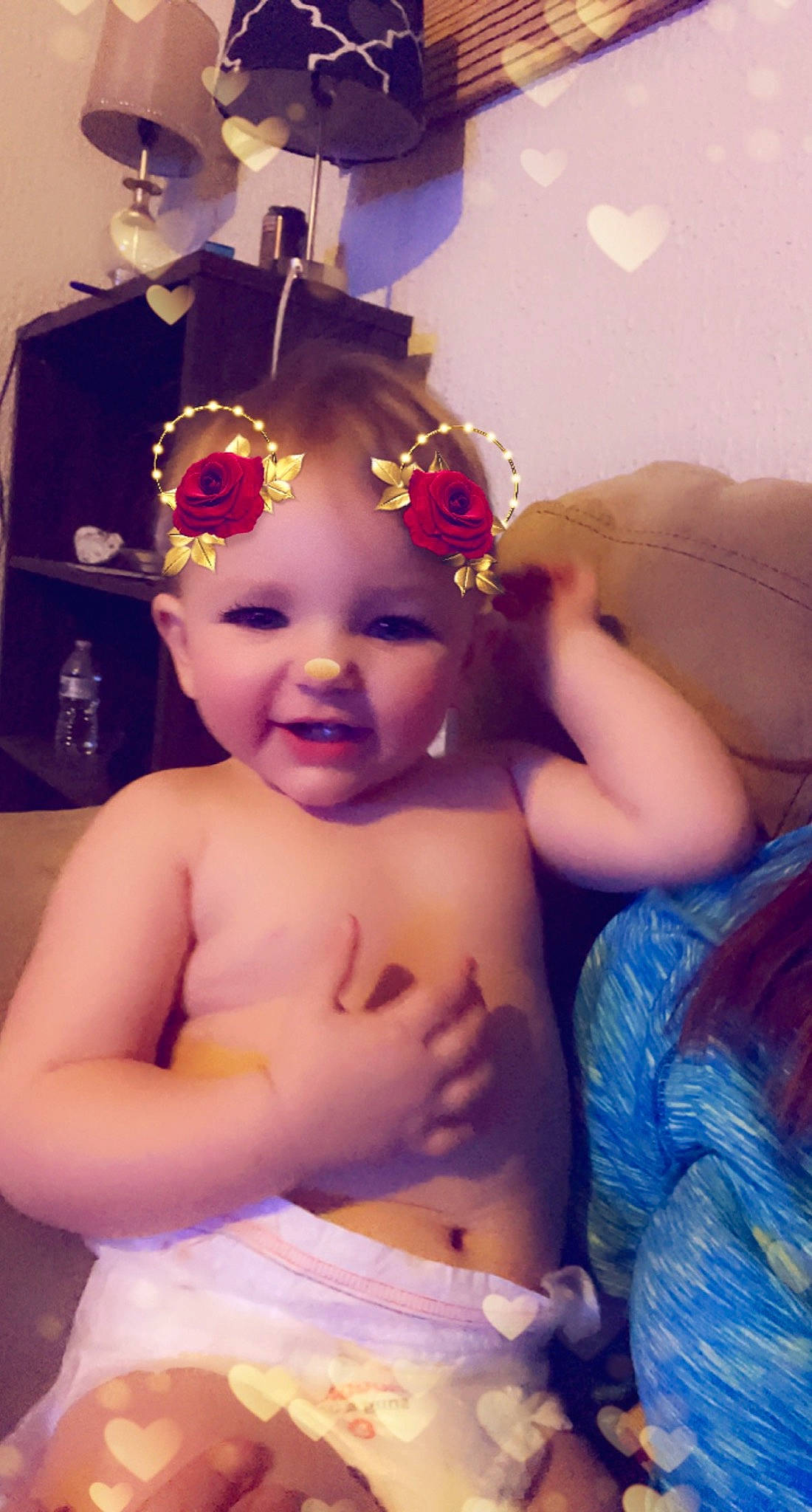 Montana is registered to the contest to win money with this photo: arm, baby, eye, face, facial_expression, finger, hairstyle, happy, head, headgear, headwear, human, human_body, iris, joy, lip, mouth, organ, person, pink