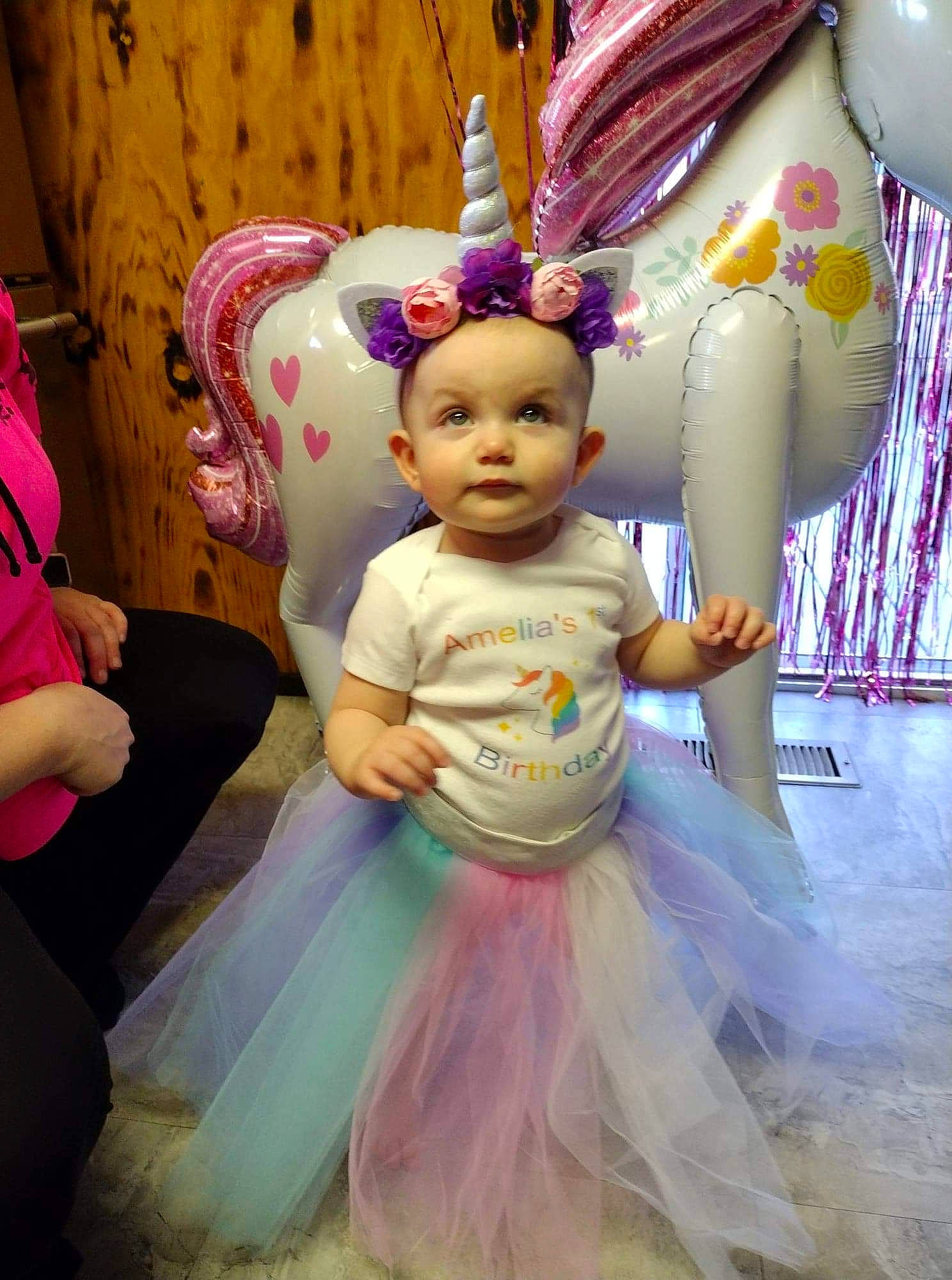 Amelia is registered to the contest to win money with this photo: baby, baby_toddler_clothing, ballet_tutu, balloon, child, event, fashion_accessory, fashion_design, formal_wear, fun, gown, happy, magenta, party_supply, peach, person, pink, purple, skin, toddler